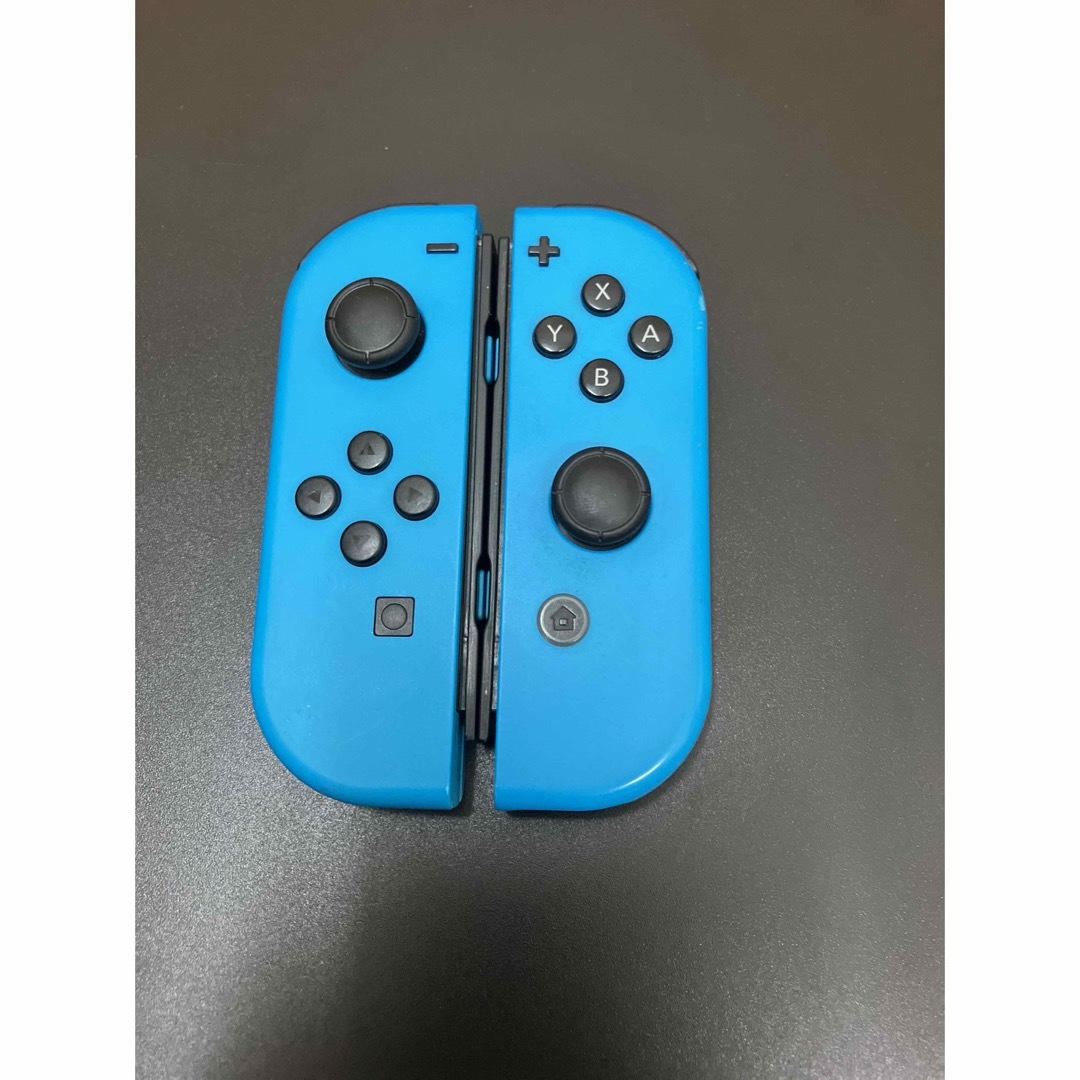 Nintendo Switch(ニンテンドースイッチ)のジャンク　Switch ジョイコン　ネオンブルー　RLセット エンタメ/ホビーのゲームソフト/ゲーム機本体(家庭用ゲーム機本体)の商品写真