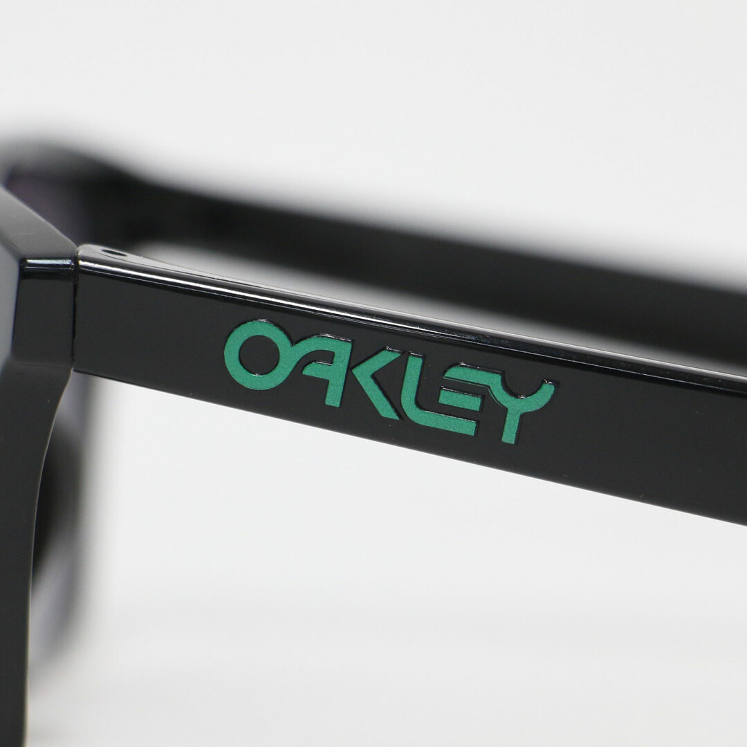 Oakley(オークリー)のOAKLEY オークリー サングラス ブラック グリーン 黒 54□17 ウェリントン カラーレンズ ミラーレンズ アジアンフィット Frogskins フロッグスキン アイウェア 大人 きれいめ カジュアル シンプル【レディース】【中古】【K4055】 レディースのファッション小物(サングラス/メガネ)の商品写真