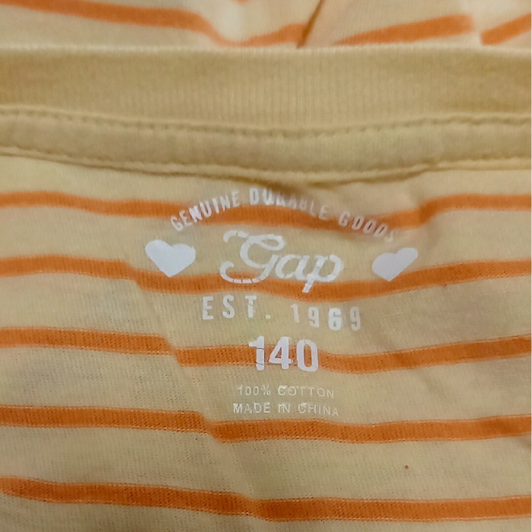 GAP(ギャップ)のオレンジ　ボーダーシャツ キッズ/ベビー/マタニティのキッズ服女の子用(90cm~)(Tシャツ/カットソー)の商品写真