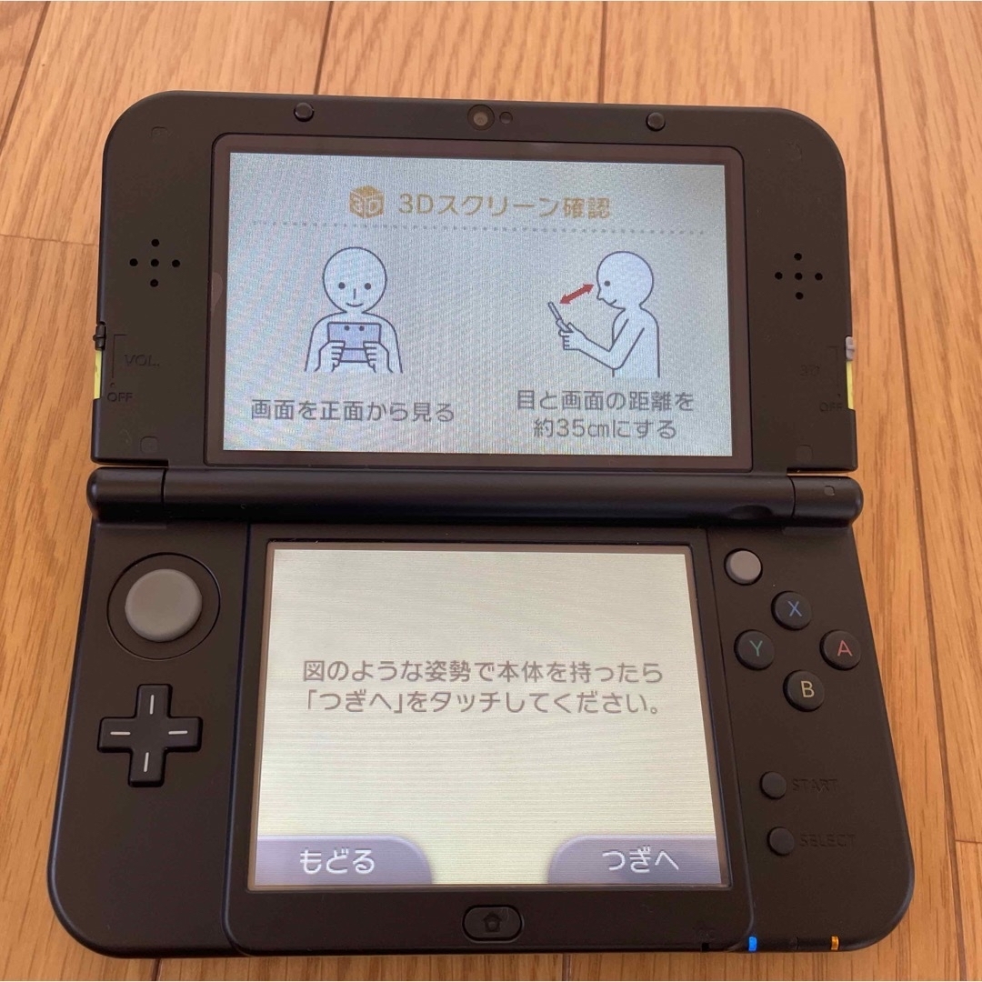 ニンテンドー3DS(ニンテンドー3DS)のNewニンテンドー3DS LL ライム×ブラック エンタメ/ホビーのゲームソフト/ゲーム機本体(携帯用ゲーム機本体)の商品写真