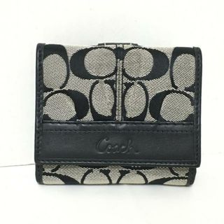 コーチ(COACH)のCOACH(コーチ) Wホック財布 シグネチャー柄 黒×アイボリー ジャガード×レザー(財布)