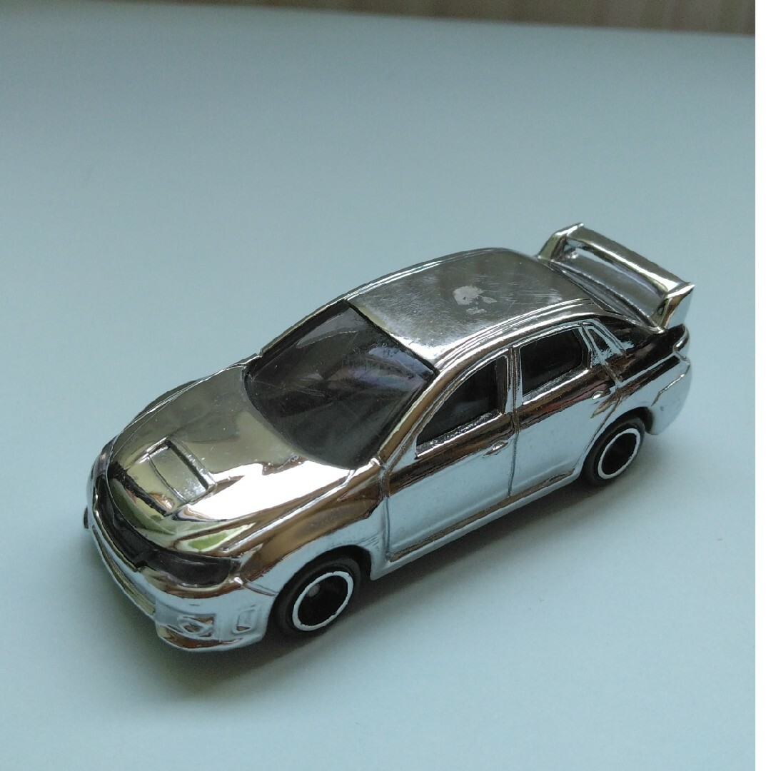 トミカ　スバルインプレッサWRX STI 銀メッキバージョン エンタメ/ホビーのおもちゃ/ぬいぐるみ(ミニカー)の商品写真