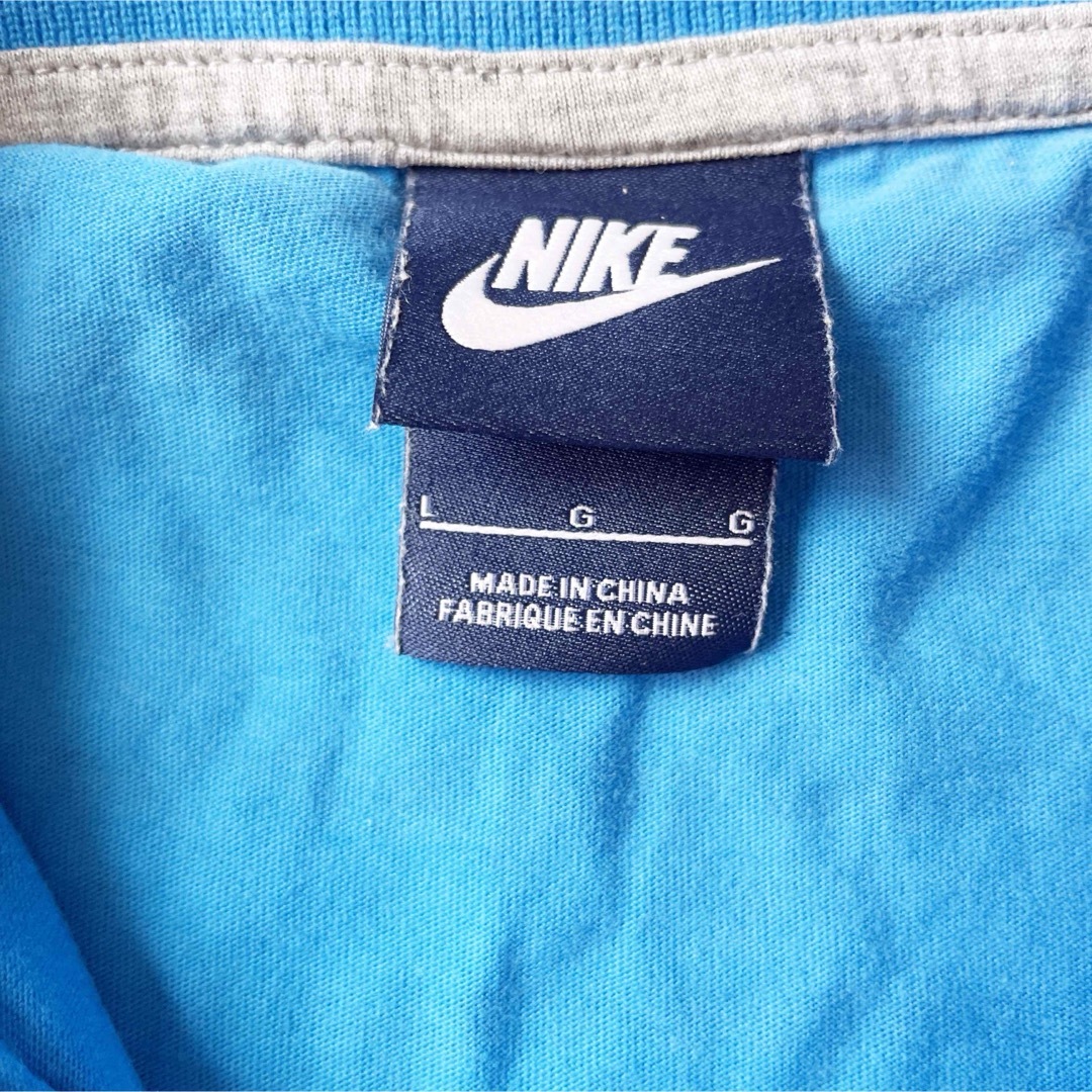 NIKE(ナイキ)のNIKE ナイキ　半袖ポロシャツ　スウォッシュ ブルー ボーダー　 Lサイズ メンズのトップス(ポロシャツ)の商品写真