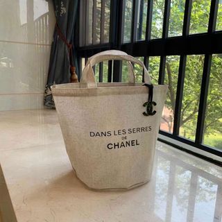 シャネル(CHANEL)のCHANEL バケットバッグ トートバッグ ノーベルティ 麻 チャーム付き(エコバッグ)