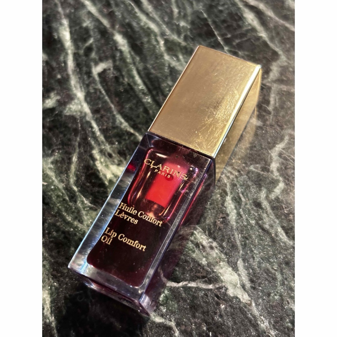 CLARINS(クラランス)のクラランス　clarins コンフォートリップオイル　レッドベリー　03  コスメ/美容のベースメイク/化粧品(リップグロス)の商品写真