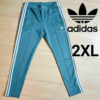 オリジナルス(Originals（adidas）)のアディダス 青緑 スーパースター トラックパンツ ジャージ 女性 スリムパンツ(その他)