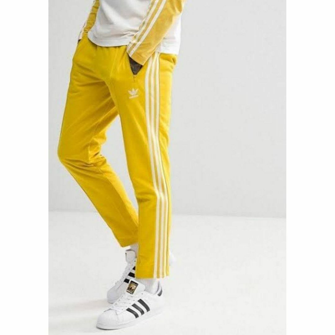 Originals（adidas）(オリジナルス)のアディダス 黄 ファイヤーバード トラックパンツ ジャージ adidas 男性S メンズのパンツ(その他)の商品写真