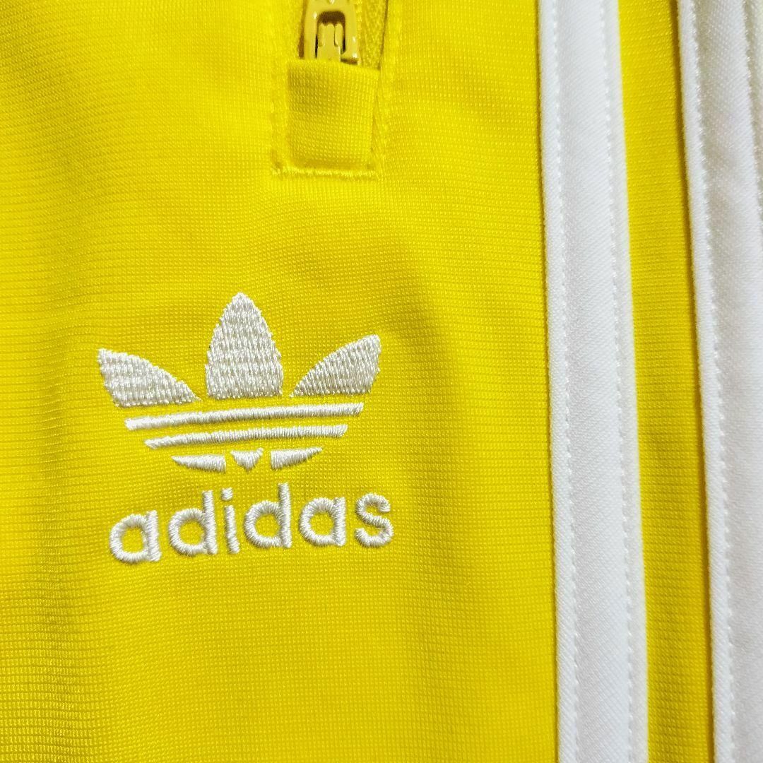 Originals（adidas）(オリジナルス)のアディダス 黄 ファイヤーバード トラックパンツ ジャージ adidas 男性S メンズのパンツ(その他)の商品写真