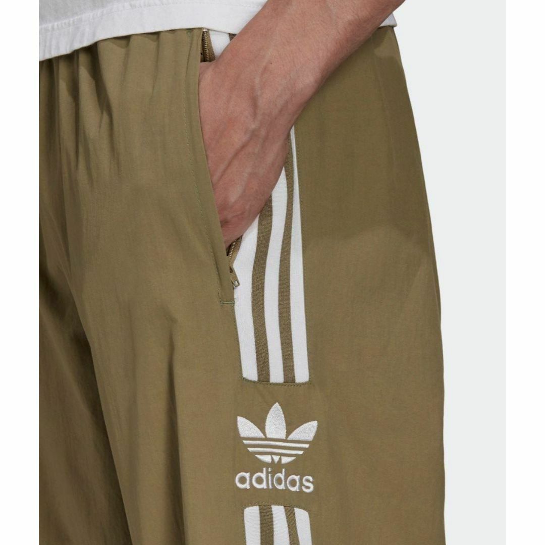 Originals（adidas）(オリジナルス)のアディダス 緑カーキ ウーブン ロックアップ トラックパンツ ジャージ 男性XS メンズのパンツ(その他)の商品写真