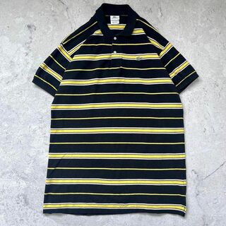 ラコステ(LACOSTE)の【ラコステ】サイズ9→XXXL 刺繍ワニロゴ ボーダー ポロシャツ 黒 黄色(ポロシャツ)
