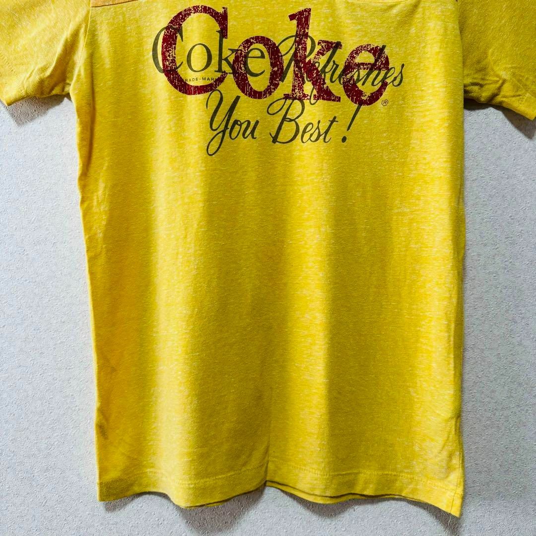 UNIQLO(ユニクロ)の【大人気】UNIQLO コカ・コーラ プリントTシャツ 半袖Tシャツ 男女兼用 メンズのトップス(Tシャツ/カットソー(半袖/袖なし))の商品写真