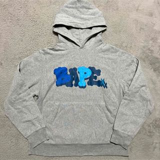 アベイシングエイプ(A BATHING APE)のAPE BAPE KAWS パーカー　スウェット　s Logo SHARK 迷彩(パーカー)