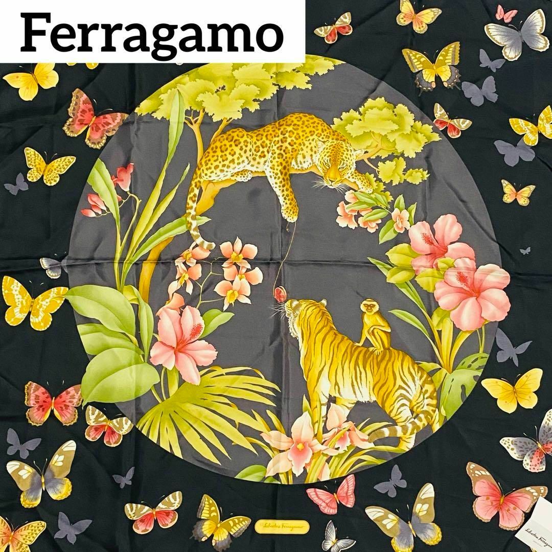 Salvatore Ferragamo(サルヴァトーレフェラガモ)の未使用品 ★Ferragamo★ スカーフ 大判 トラ ヒョウ 花 蝶 ブラック レディースのファッション小物(バンダナ/スカーフ)の商品写真