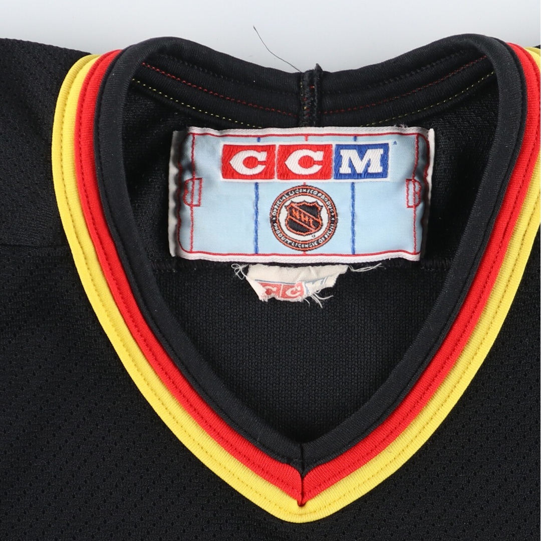 古着 CCM NHL VANCOUVER  CANUCKS バンクーバーカナックス Vネック メッシュ ゲームシャツ ホッケーシャツ メンズM /eaa428348 メンズのトップス(Tシャツ/カットソー(半袖/袖なし))の商品写真