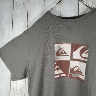 クイックシルバー(QUIKSILVER)の【クイックシルバー】サーファープリントTシャツ メンズ L US 輸入 古着(Tシャツ/カットソー(半袖/袖なし))