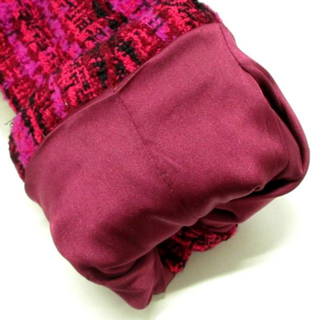 CHANEL(シャネル)のCHANEL(シャネル) スカートスーツ サイズ38 M レディース - P05899 ピンク×黒×レッド ツイード ウール、ナイロン レディースのフォーマル/ドレス(スーツ)の商品写真