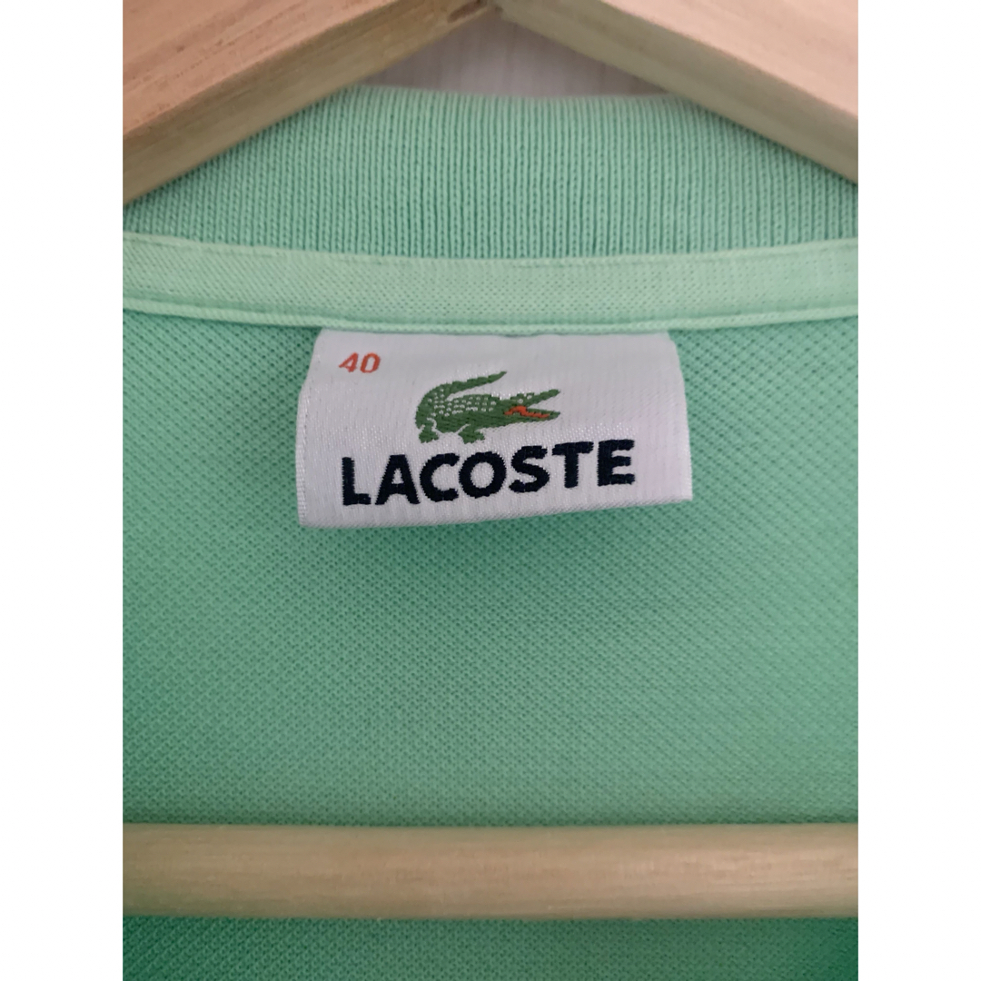 LACOSTE(ラコステ)のLACOSTE ポロシャツ　サイズ40  ダメージあります。 レディースのトップス(ポロシャツ)の商品写真