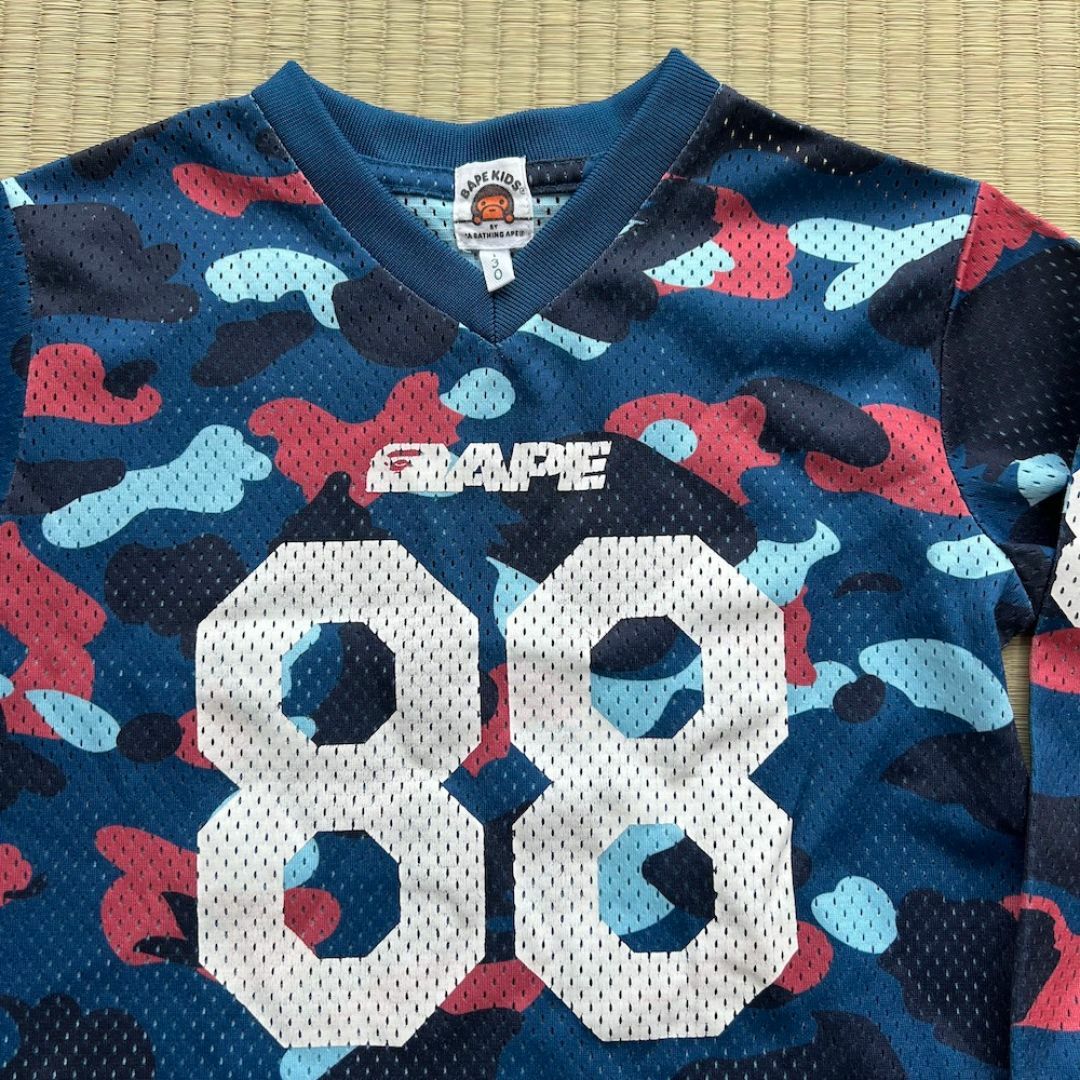 A BATHING APE(アベイシングエイプ)のBAPE キッズ 長袖Tシャツ 迷彩 130cm メッシュ スポーツ キッズ/ベビー/マタニティのキッズ服男の子用(90cm~)(Tシャツ/カットソー)の商品写真