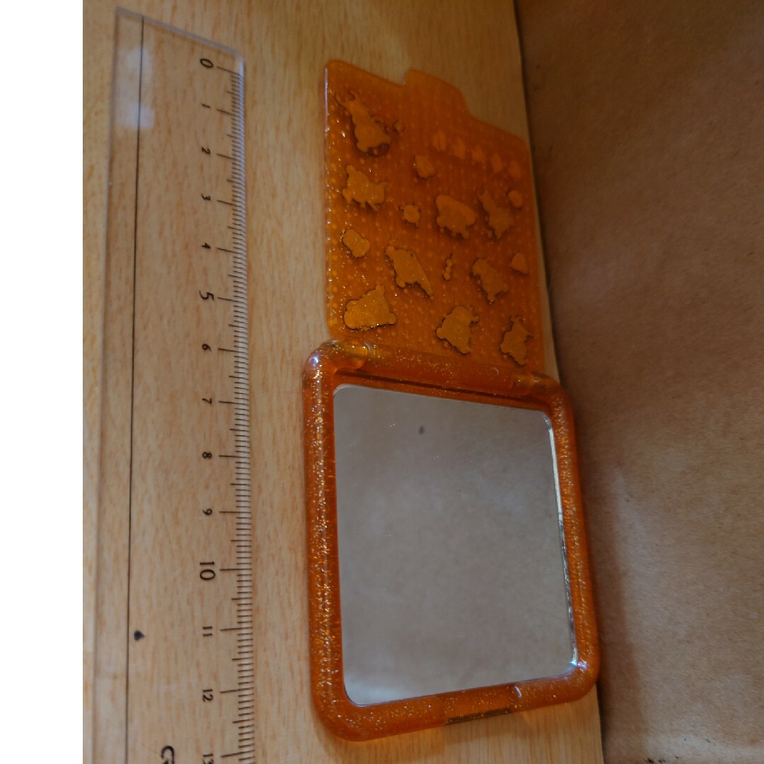 サンエックス(サンエックス)のリラックマ　ミラー　鏡　オレンジ系　橙色 エンタメ/ホビーのおもちゃ/ぬいぐるみ(キャラクターグッズ)の商品写真