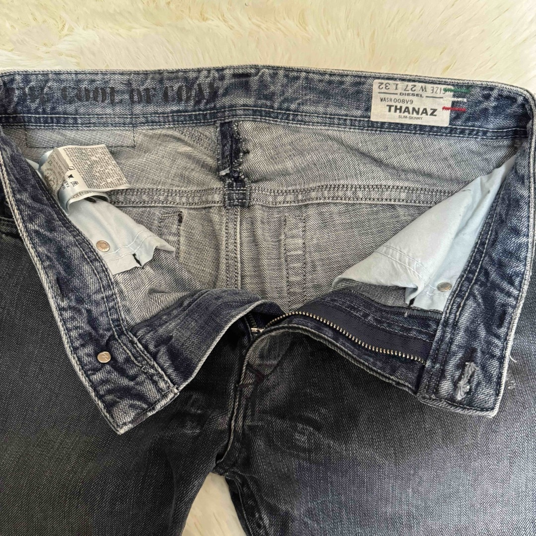 DIESEL(ディーゼル)のDIESEL ディーゼル THANAZ ブラックジーンズ　ダメージ加工 メンズのパンツ(デニム/ジーンズ)の商品写真