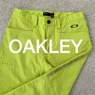 オークリー(Oakley)のオークリー OAKLEY スカル メンズ ゴルフパンツ 33インチ 蛍光イエロー(ウエア)