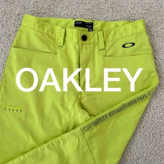 オークリー(Oakley)のオークリー OAKLEY スカル メンズ ゴルフパンツ 33インチ 蛍光イエロー(ウエア)