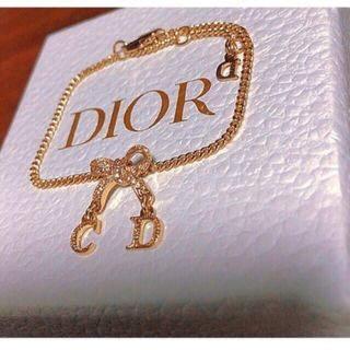 クリスチャンディオール(Christian Dior)のDior  ロゴ リボン ゴールド ブレスレット可愛い ストーン (ブレスレット/バングル)