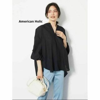 アメリカンホリック(AMERICAN HOLIC)の新品 オフィスカジュアル 春夏トップス バックオープンシアーブラウス 黒色(シャツ/ブラウス(長袖/七分))