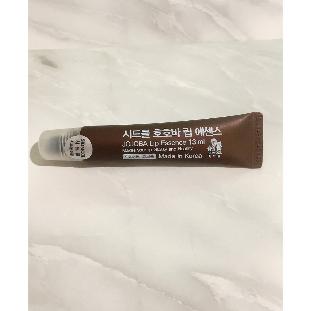 Jojoba リップエッセンス 韓国 コスメ/美容のスキンケア/基礎化粧品(リップケア/リップクリーム)の商品写真