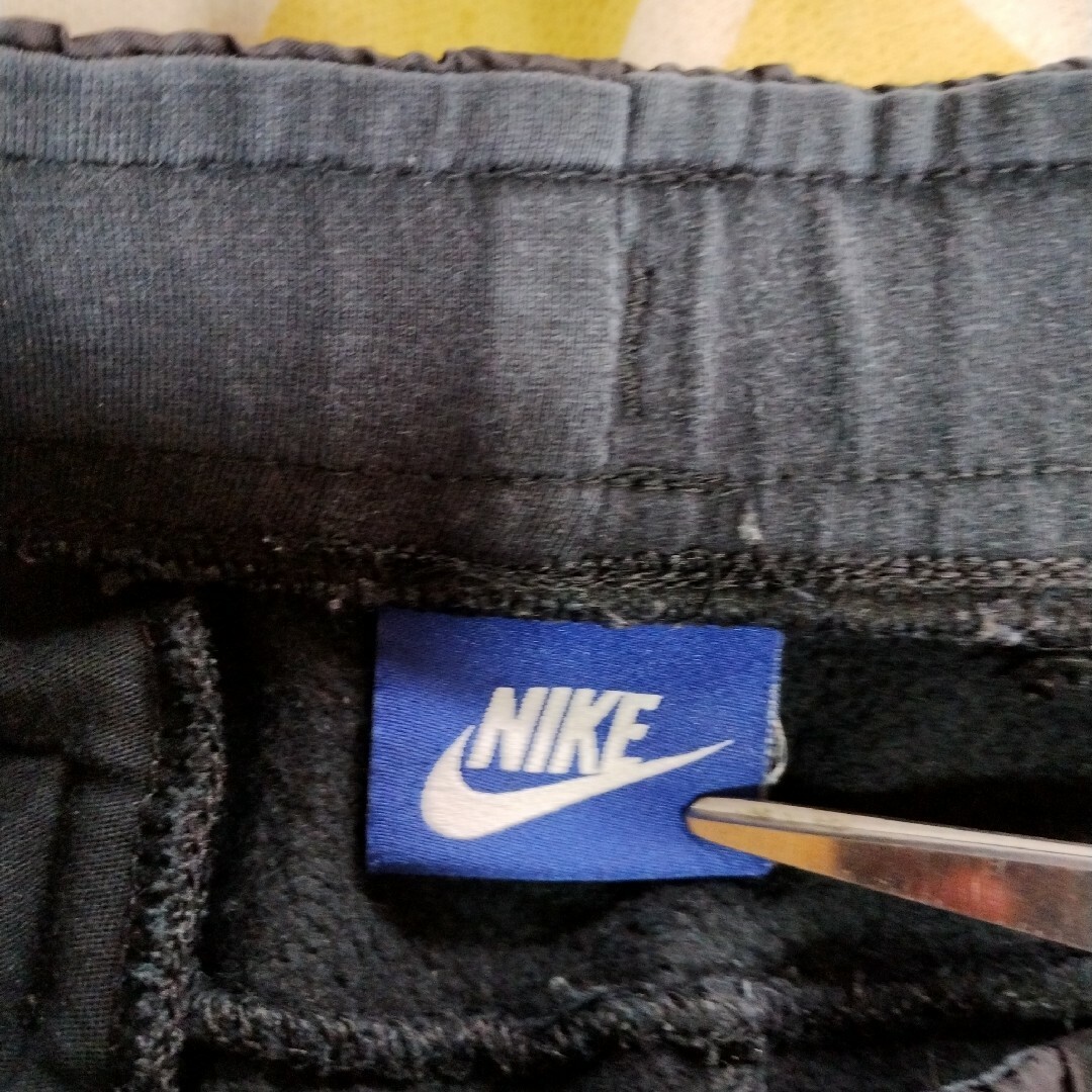 NIKE(ナイキ)のNIKE　ビッグスウッシュ デカロゴ　 スウェットパンツ　古着　レア　M　黒 メンズのパンツ(その他)の商品写真