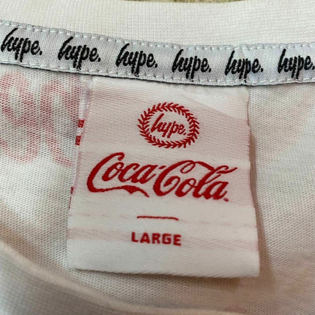 コカ・コーラ(コカコーラ)のHYPE Coca Cola 総柄　Tシャツ レディースL メンズM レディースのトップス(Tシャツ(半袖/袖なし))の商品写真