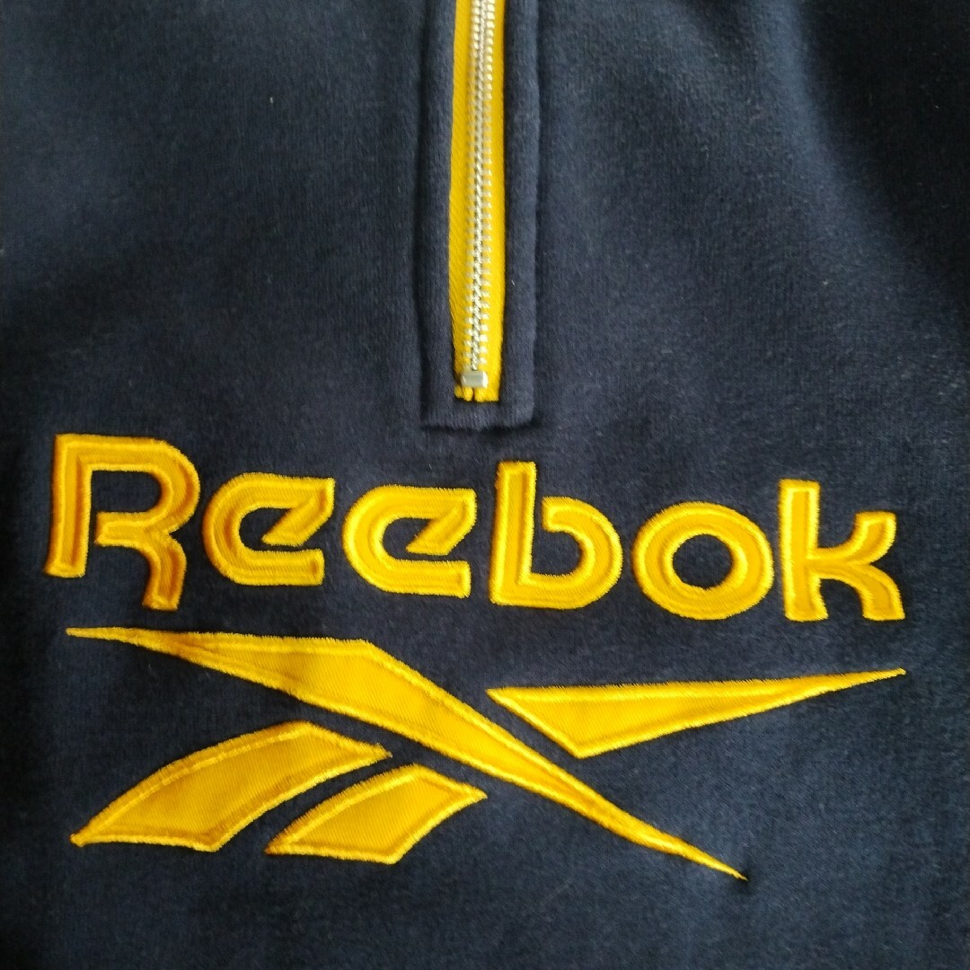 Reebok(リーボック)のReebok　リーボック　ハーフジップ　トレーナー　XL　古着　青✕黄　デカロゴ メンズのトップス(スウェット)の商品写真