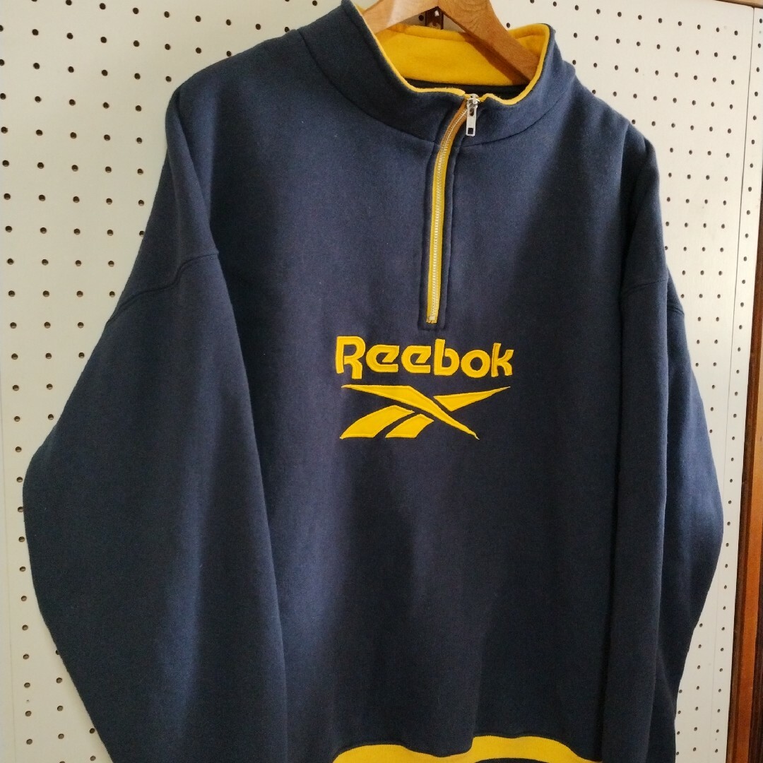 Reebok(リーボック)のReebok　リーボック　ハーフジップ　トレーナー　XL　古着　青✕黄　デカロゴ メンズのトップス(スウェット)の商品写真