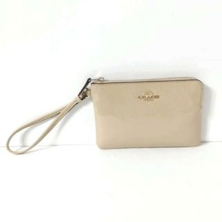 コーチ(COACH)のCOACH(コーチ) リストレット - F55739 ベージュ エナメル（レザー）(ポーチ)