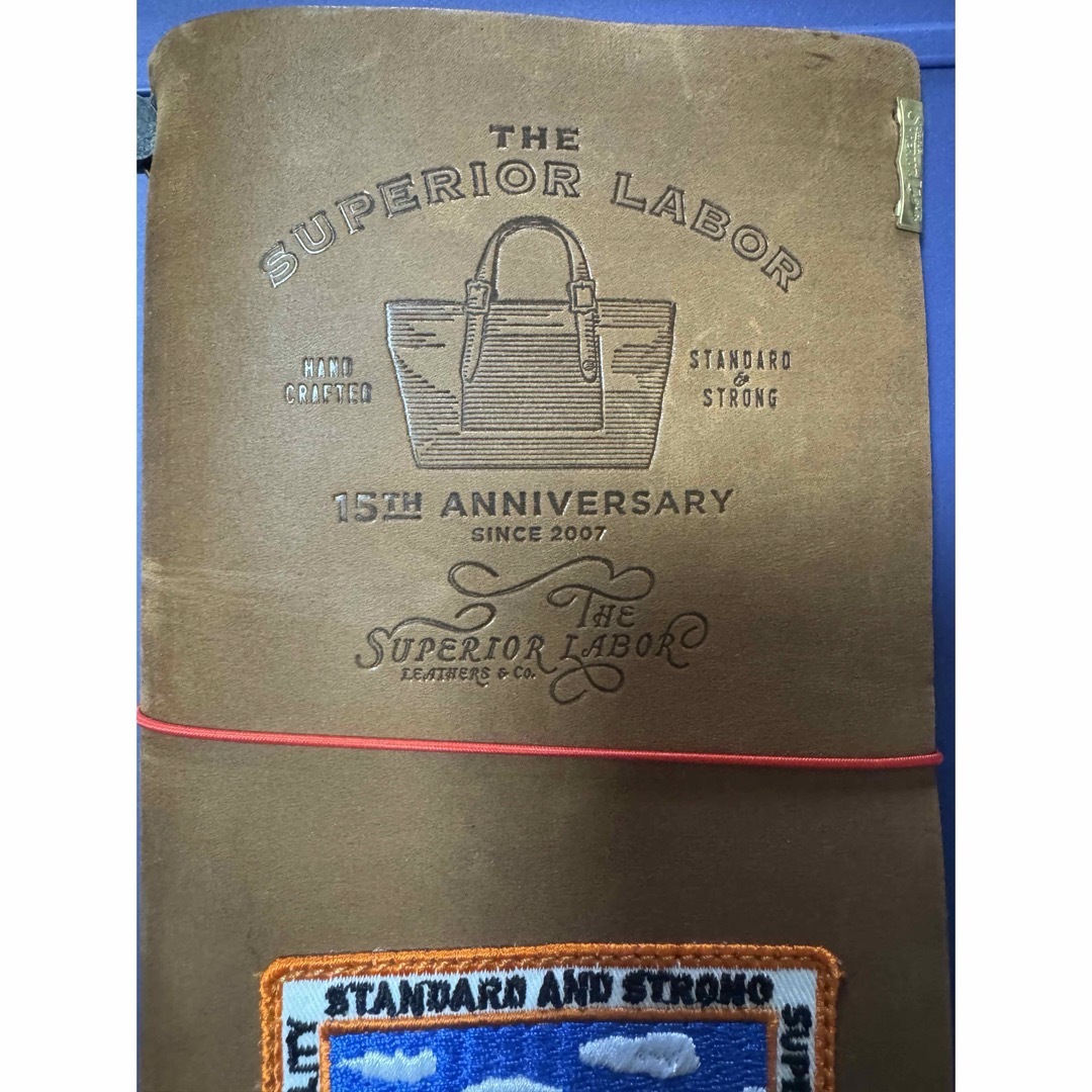 The Superior Labor の15周年を記念したコラボ メンズのファッション小物(手帳)の商品写真