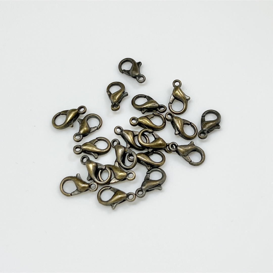 カニカン 金古美 約10×5mm 40個 真鍮製ニッケルフリー ハンドメイド素材 ハンドメイドの素材/材料(各種パーツ)の商品写真