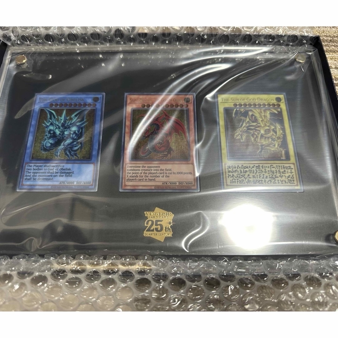 KONAMI(コナミ)の遊戯王OCGデュエルモンスターズ「三幻神」スペシャルカードセット（ステンレス製） エンタメ/ホビーのトレーディングカード(その他)の商品写真