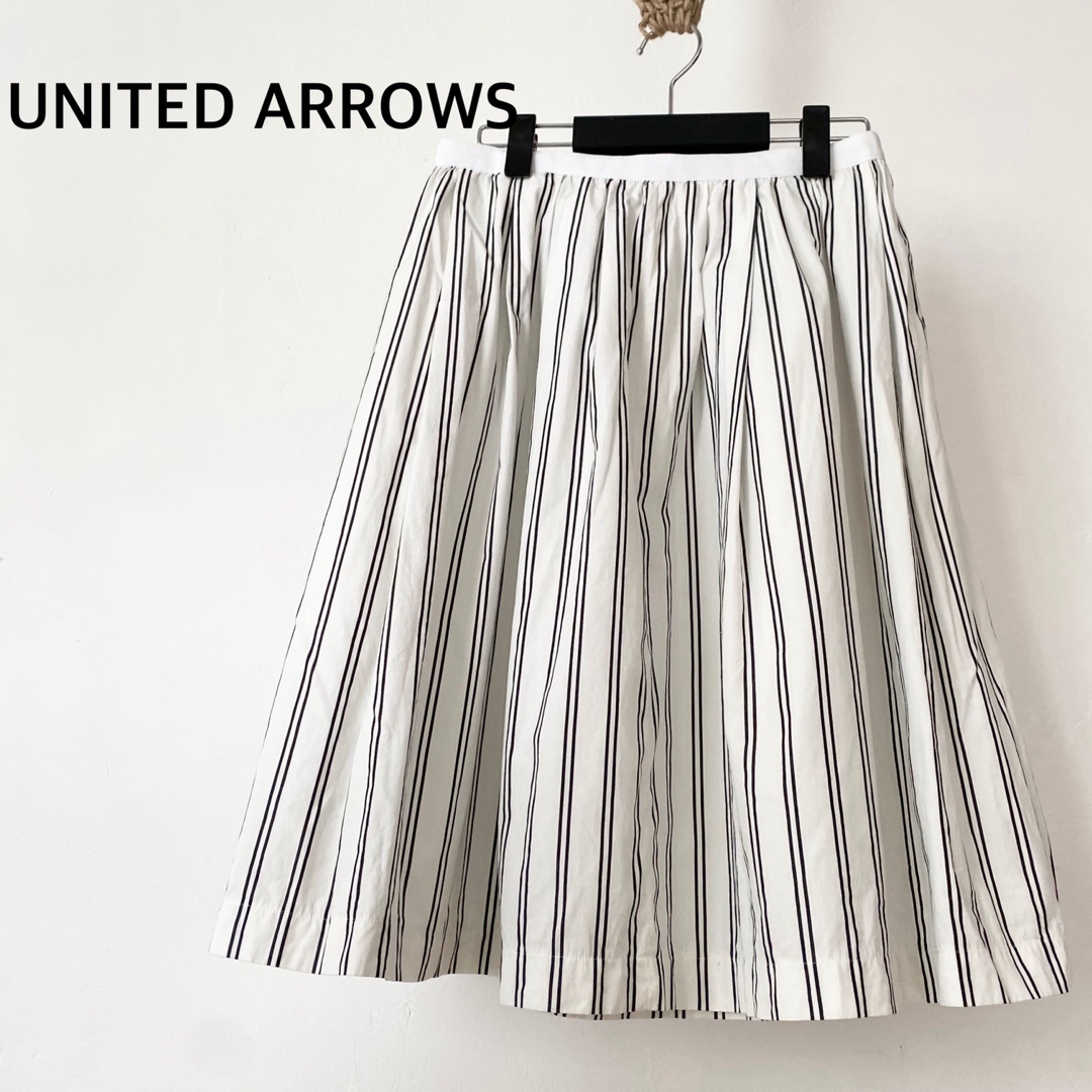 UNITED ARROWS(ユナイテッドアローズ)のユナイテッドアローズ　ストライプ　スカート　ホワイト　コットン　日本製　膝下丈 レディースのスカート(その他)の商品写真