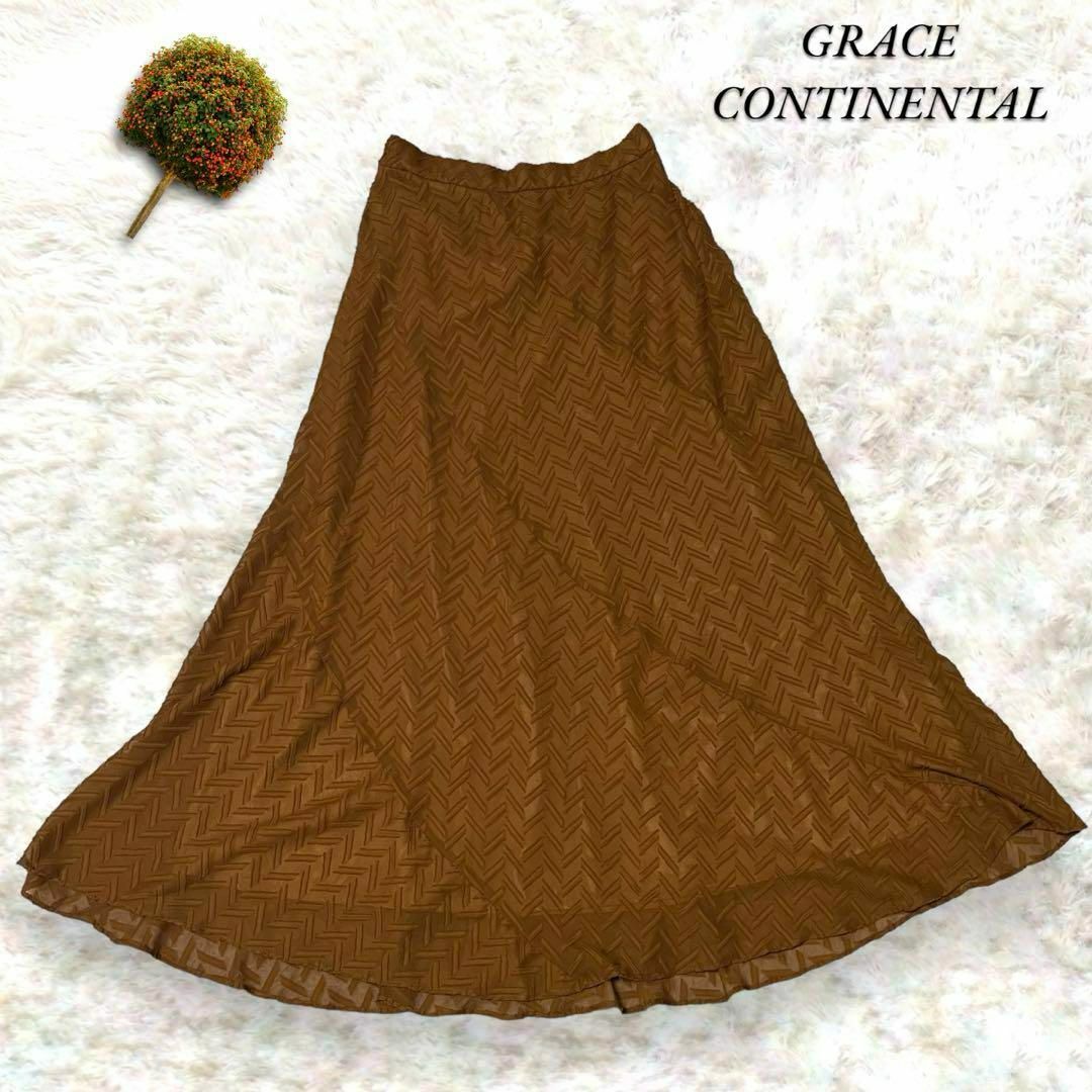 GRACE CONTINENTAL(グレースコンチネンタル)のグレースコンチネンタル ロング スカート フレア 総柄 ウエストゴム  茶 36 レディースのスカート(ロングスカート)の商品写真