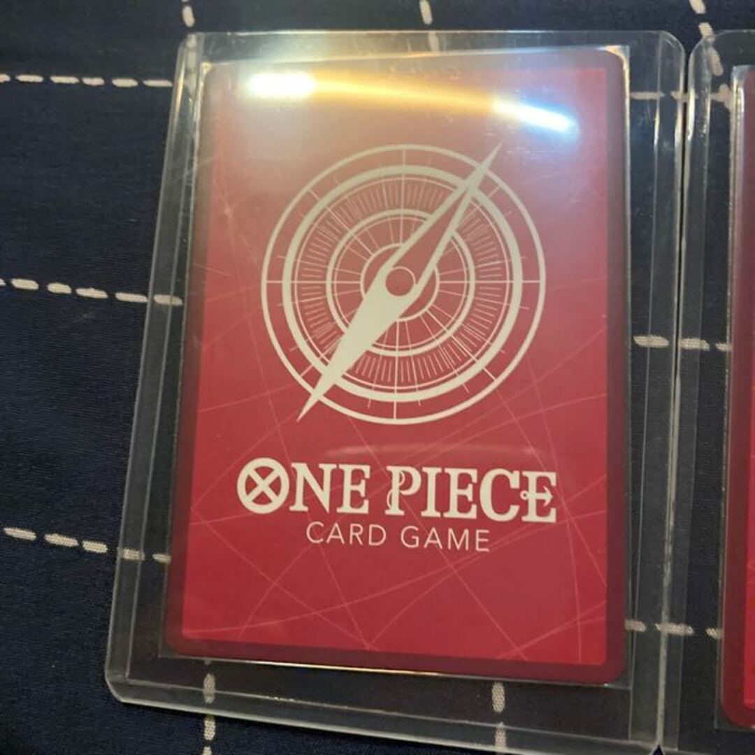 ONE PIECE(ワンピース)のワンピースカードゲーム　フォクシー　モンキー・D・ドラゴン　リーダーパラレル　５００年後の未来　ONE PIECE エンタメ/ホビーのトレーディングカード(シングルカード)の商品写真