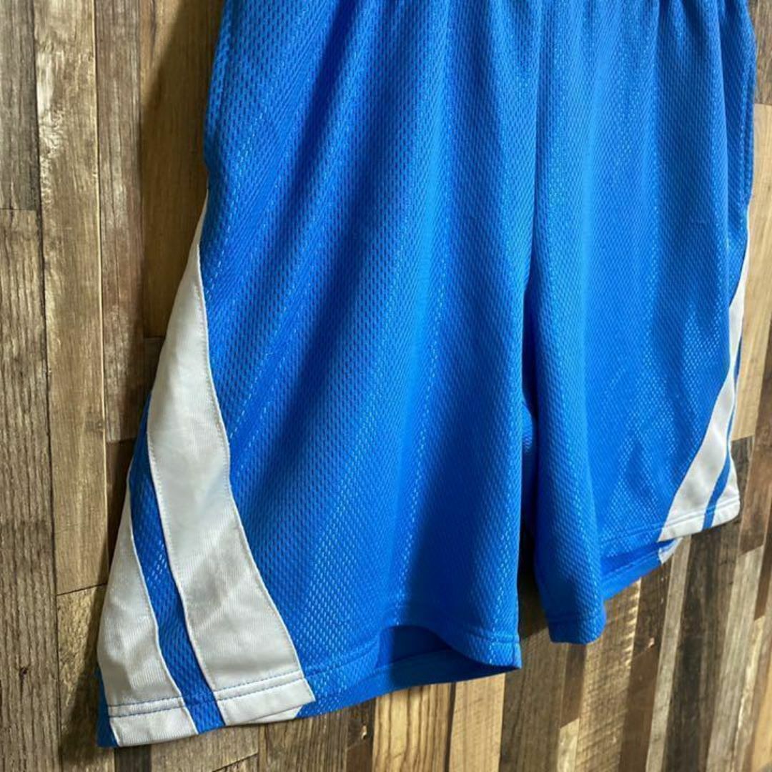 Champion(チャンピオン)のチャンピオン UNC バスパン ストリート ハーフ パンツ ロゴ 青 白 古着 メンズのパンツ(ショートパンツ)の商品写真