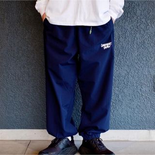 ステューシー(STUSSY)のCONVENIENT STORE ナイロン パンツ シャカシャカ パンツ L 黒(ワークパンツ/カーゴパンツ)