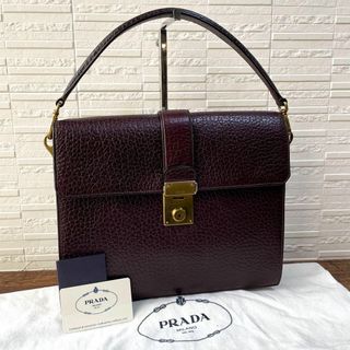 プラダ(PRADA)のプラダ レザー ハンド ビジネス バッグ フラップ 鍵付き ダークブラウン(ビジネスバッグ)