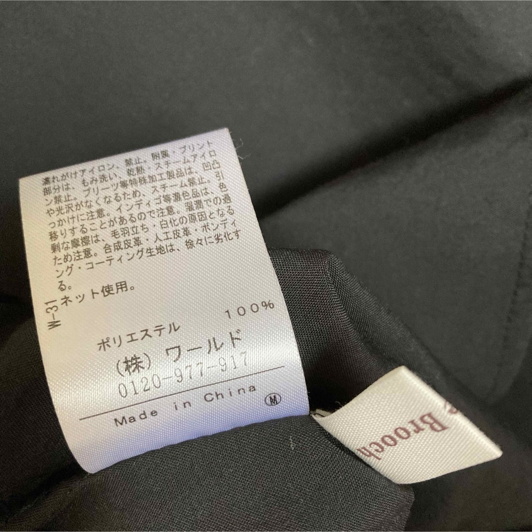 Couture Brooch(クチュールブローチ)の試着のみ クチュールブローチ フリルスタンドチュニック ブラック 38 黒 レディースのトップス(シャツ/ブラウス(長袖/七分))の商品写真