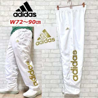 アディダス(adidas)のadidas アディダス ゴールド ラメプリント トラックパンツ 裏地付き(その他)