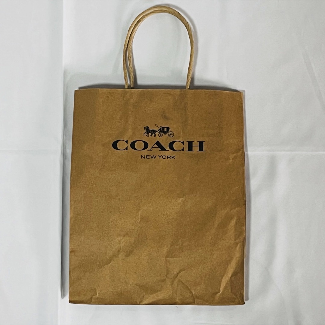 COACH(コーチ)の【送料無料！匿名配送！】COACH★コーチ★紙袋★ショップ袋★取っ手ブラウン② レディースのバッグ(ショップ袋)の商品写真