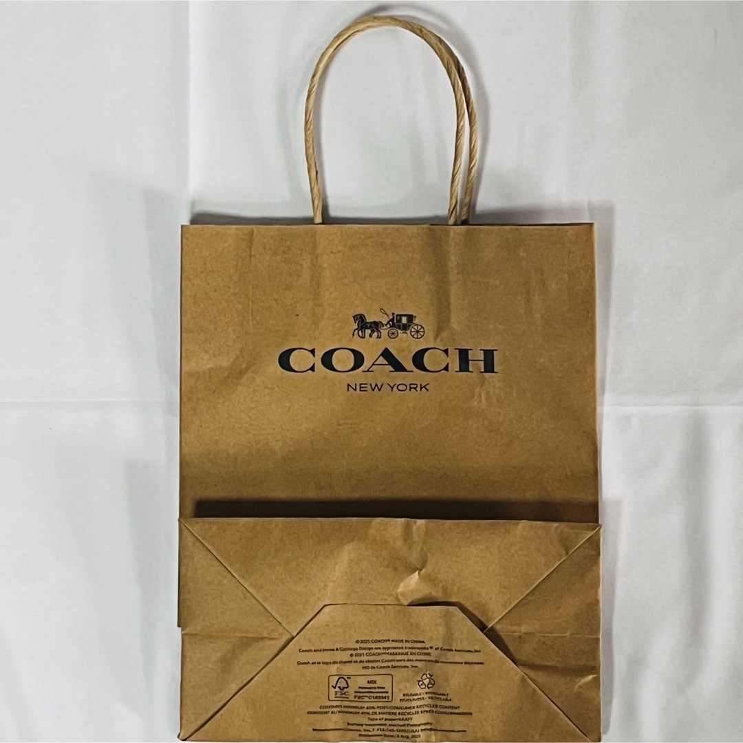 COACH(コーチ)の【送料無料！匿名配送！】COACH★コーチ★紙袋★ショップ袋★取っ手ブラウン② レディースのバッグ(ショップ袋)の商品写真