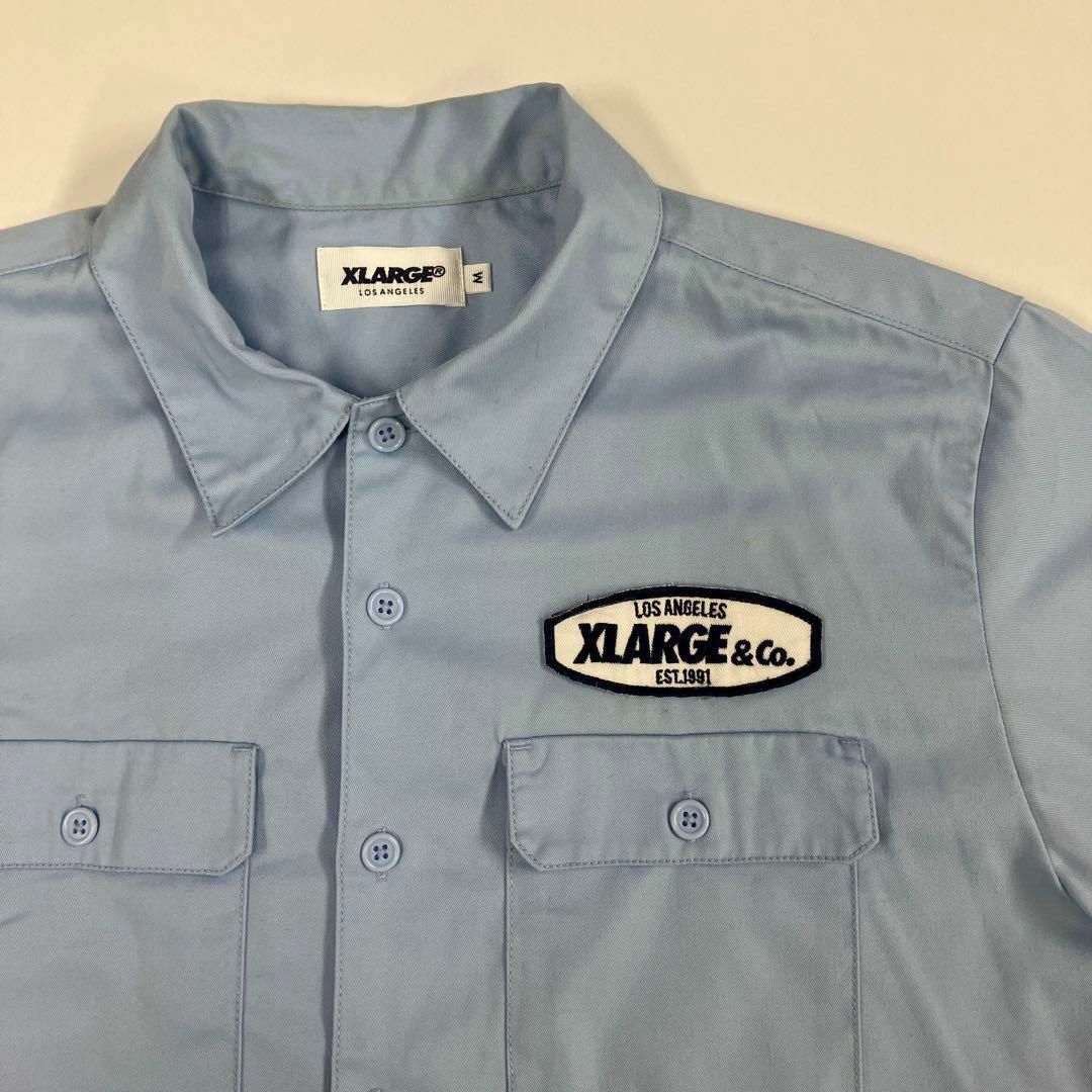 XLARGE(エクストララージ)のエクストララージ　ワークシャツ　ワッペン　古着　ストリート　ブルー メンズのトップス(シャツ)の商品写真