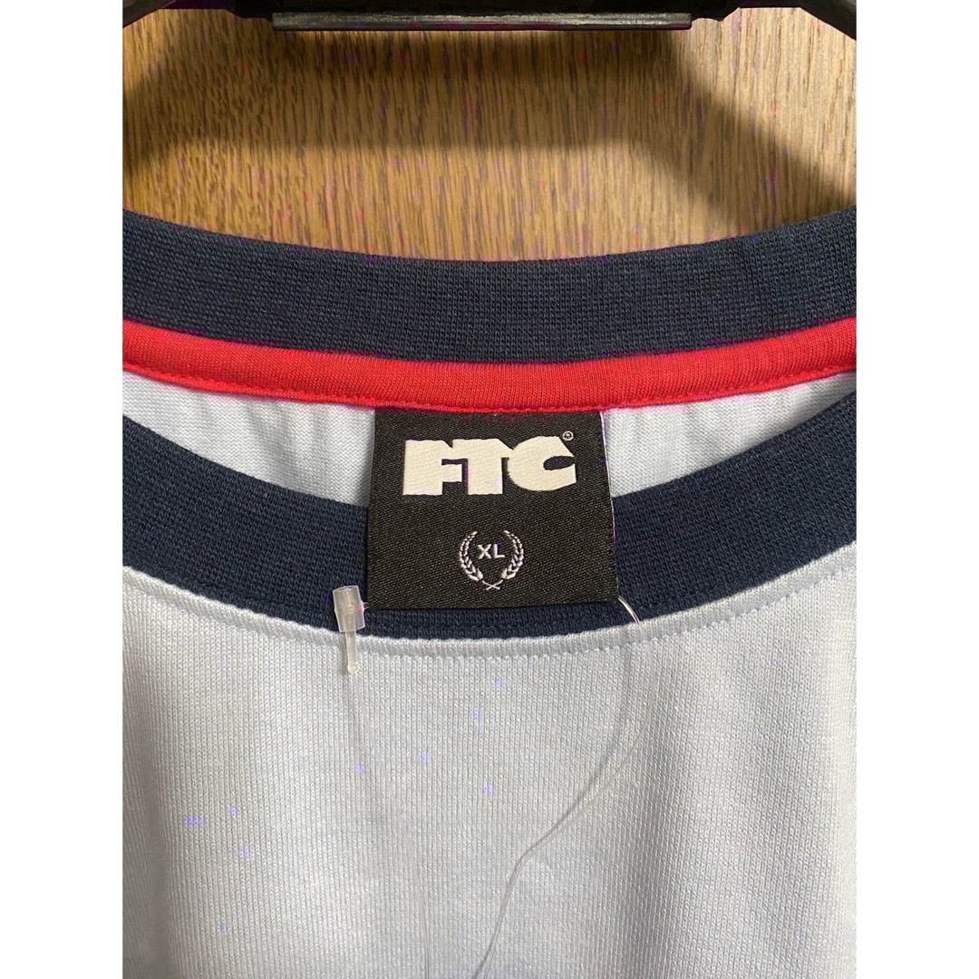 FTC(エフティーシー)のFTC OVAL LOGO RINGER TEE リンガー Tシャツ ブルー メンズのトップス(Tシャツ/カットソー(半袖/袖なし))の商品写真