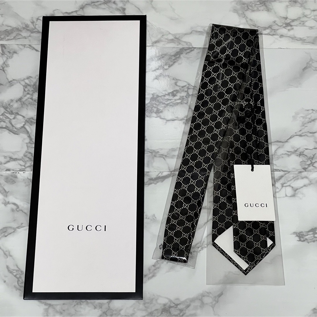 Gucci(グッチ)のGUCCI ネクタイ【美品】グッチGG柄 総柄 黒 ブラック.ゴールド シルク メンズのファッション小物(ネクタイ)の商品写真